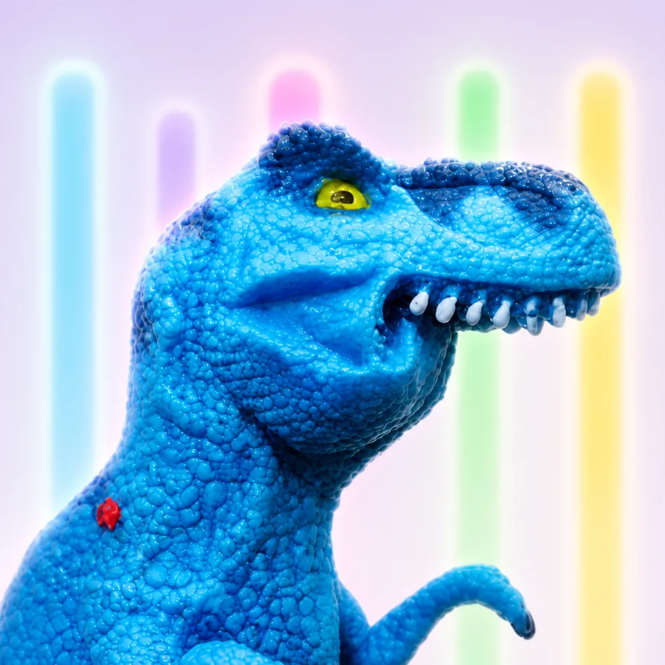 FEFER, the blue toy dinosaur with a missing lower jaw